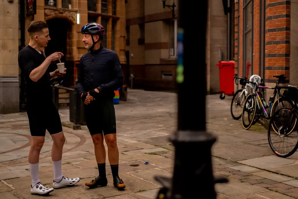 Gareth Winter standing with Rapha founder Simon Mottram at the start line of Manchester to London